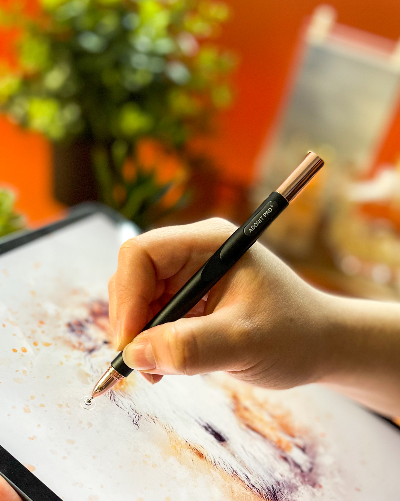 Painting a dog portrait on iPad, orange backdrop