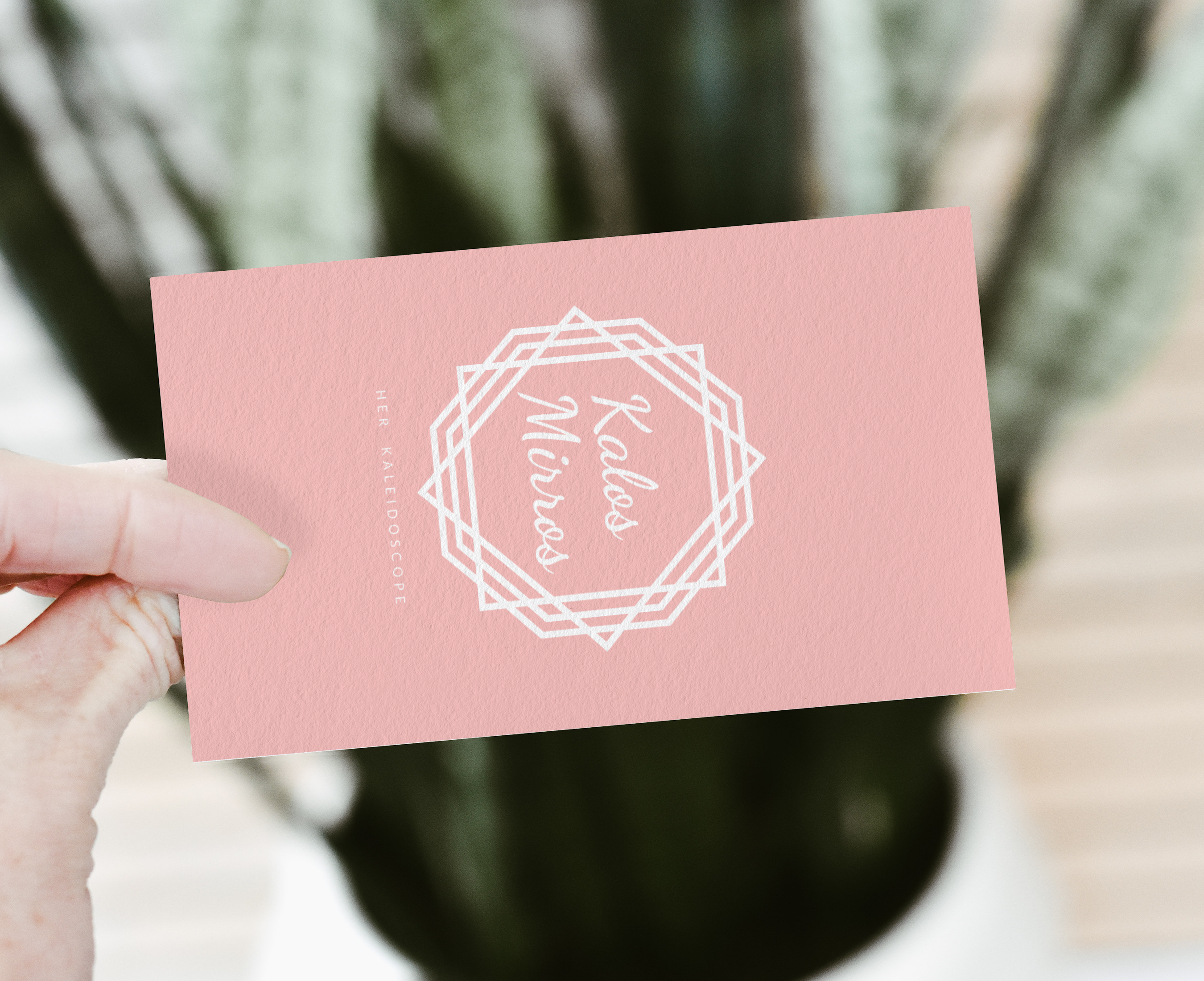 Business card held in hand